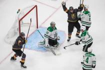 Vegas Golden Knights' Mark Stone (61) and Paul Stastny (26) celebrate a goal against Dallas Sta ...