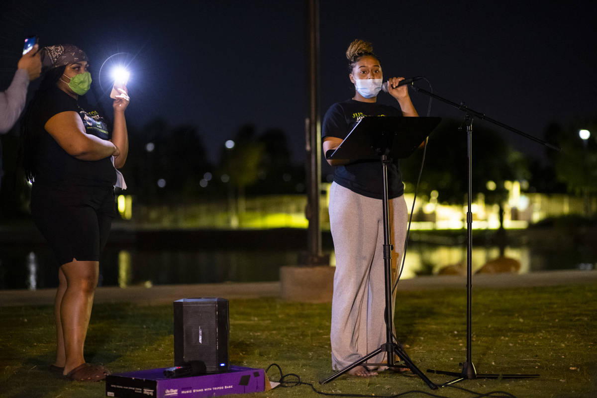 Desiree Smith, founder of More Than A Hashtag, speaks during a candlelight vigil for Jorge Gome ...