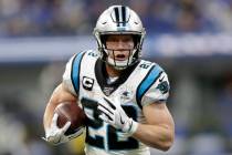 FILE - In this Dec. 22, 2019, file photo, Carolina Panthers' Christian McCaffrey runs during th ...