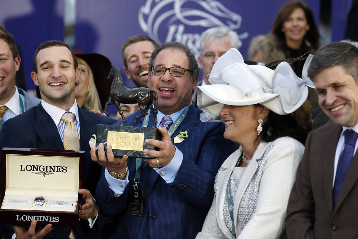 Ahmed Zayat, center, owner of American Pharoah, celebrates in the winner's circle after America ...