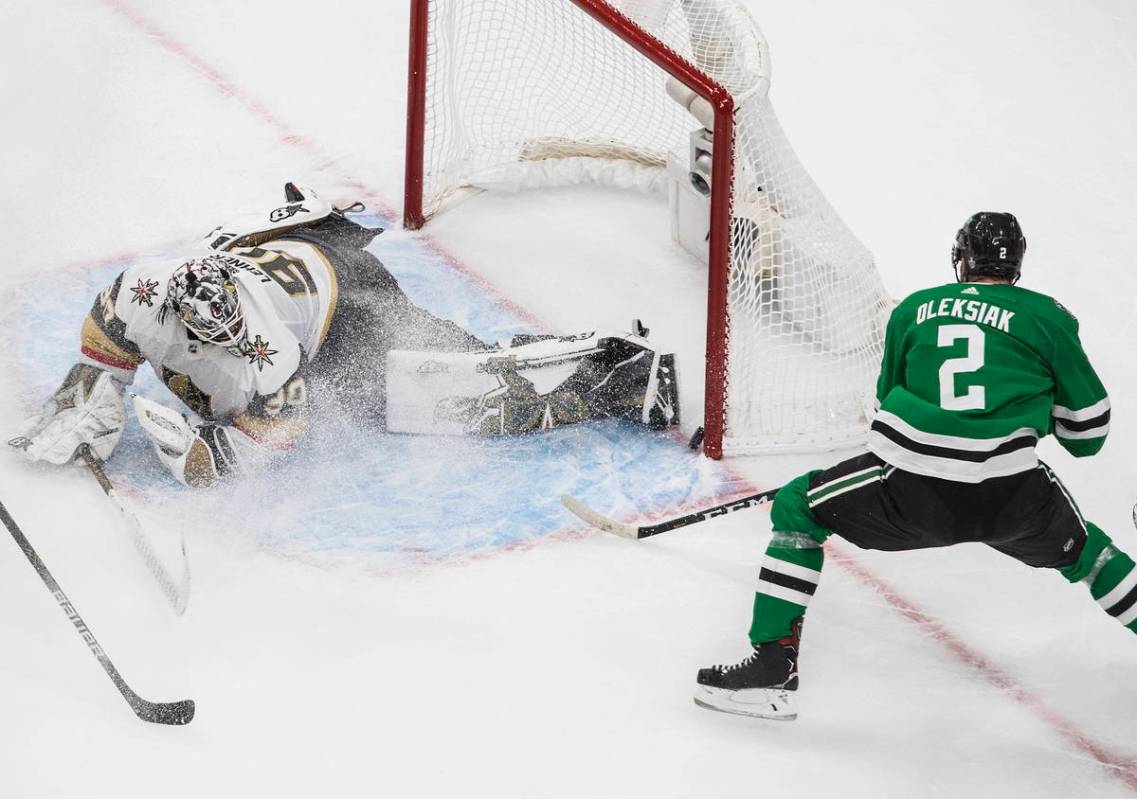 Dallas Stars defenseman Jamie Oleksiak (2) scores on Vegas Golden Knights goaltender Robin Lehn ...