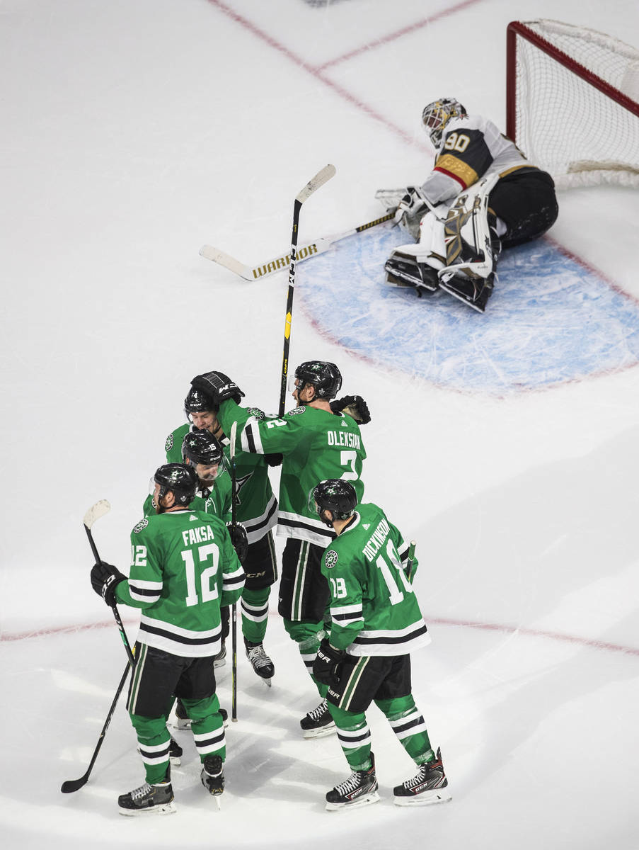Dallas Stars celebrate a goal by Jamie Oleksiak as Vegas Golden Knights goalie Robin Lehner (90 ...