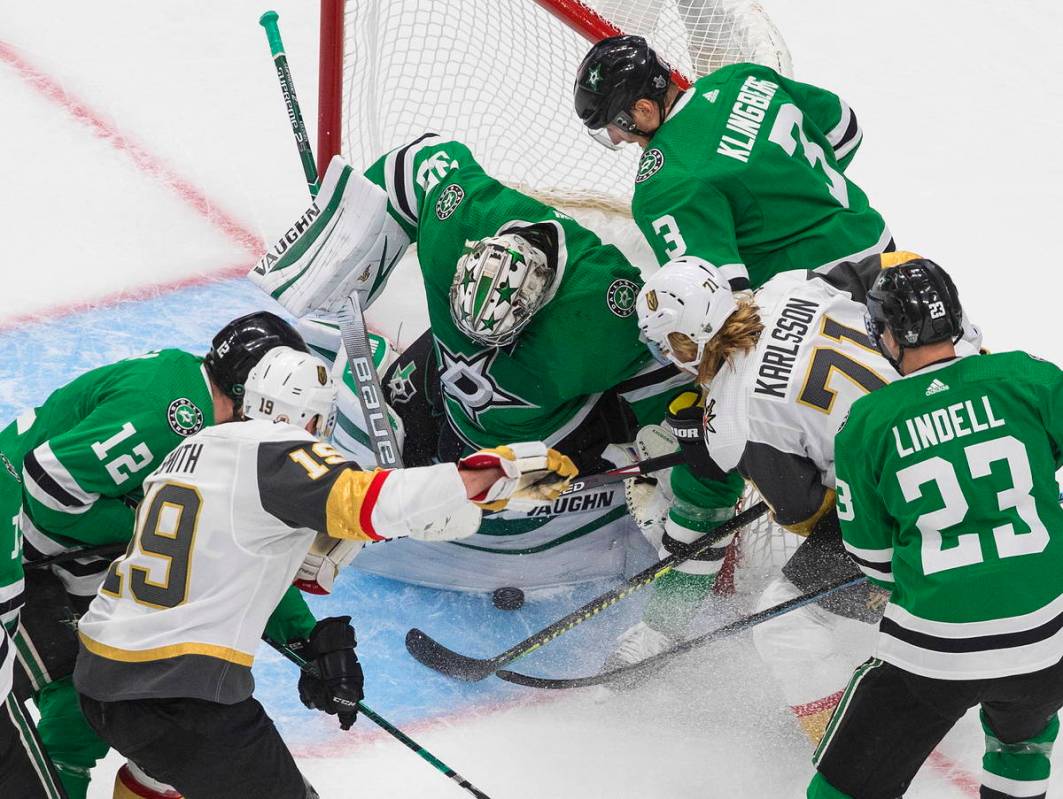 Dallas Stars goalie Anton Khudobin (35) makes a save on Vegas Golden Knights' William Karlsson ...