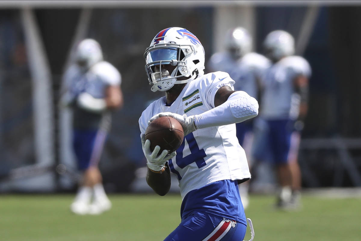 Buffalo Bills wide receiver Stefon Diggs (14) catches a pass during an NFL football training ca ...