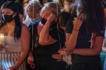 Aracely Palacio, center, mourns the death of her daughter Lesly Palacio, as sister Karely Pala ...