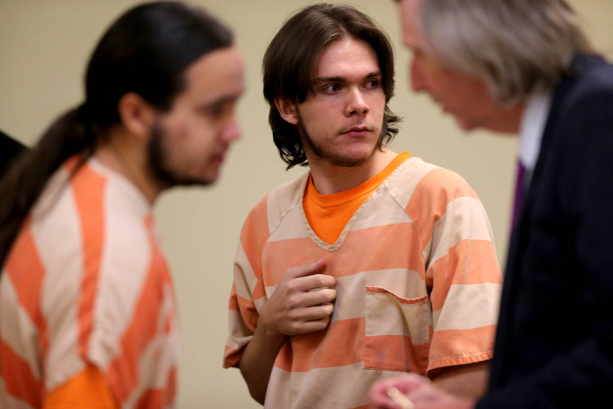 Michael Wilson, center, during a break in a preliminary hearing in Pahrump Justice Court Thursd ...