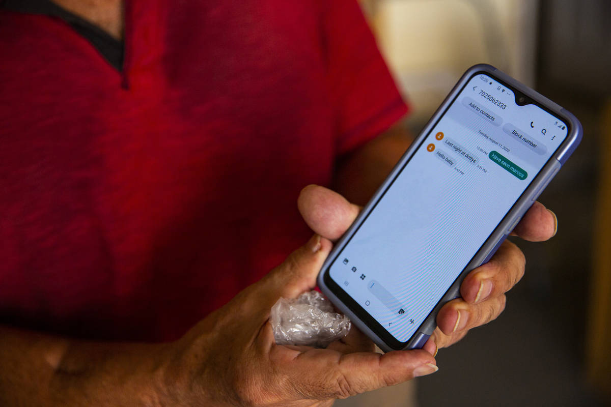 Yehuda Sharon, a witness in the high profile Margaret Rudin murder case, shows text messages on ...
