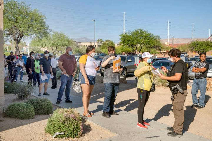 People wait in line at the Nevada Department of Motor Vehicles at 8250 West Flamingo Road, Las ...