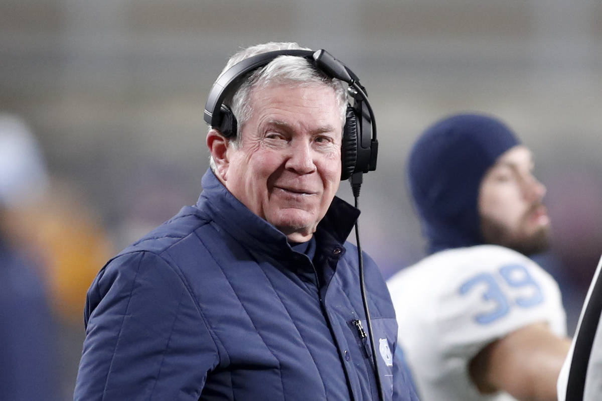 FILE - In this Nov. 14, 2019, file photo, North Carolina head coach Mack Brown stands on the si ...
