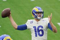 Los Angeles Rams quarterback Jared Goff warms up before an NFL football game against the Dallas ...