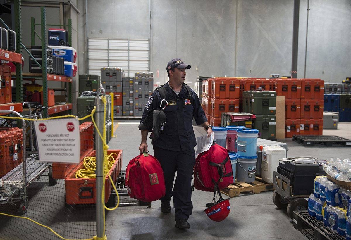 Jason Ritz from Clark County Fire Department unloads gear packed for the Hurricane Florence mis ...
