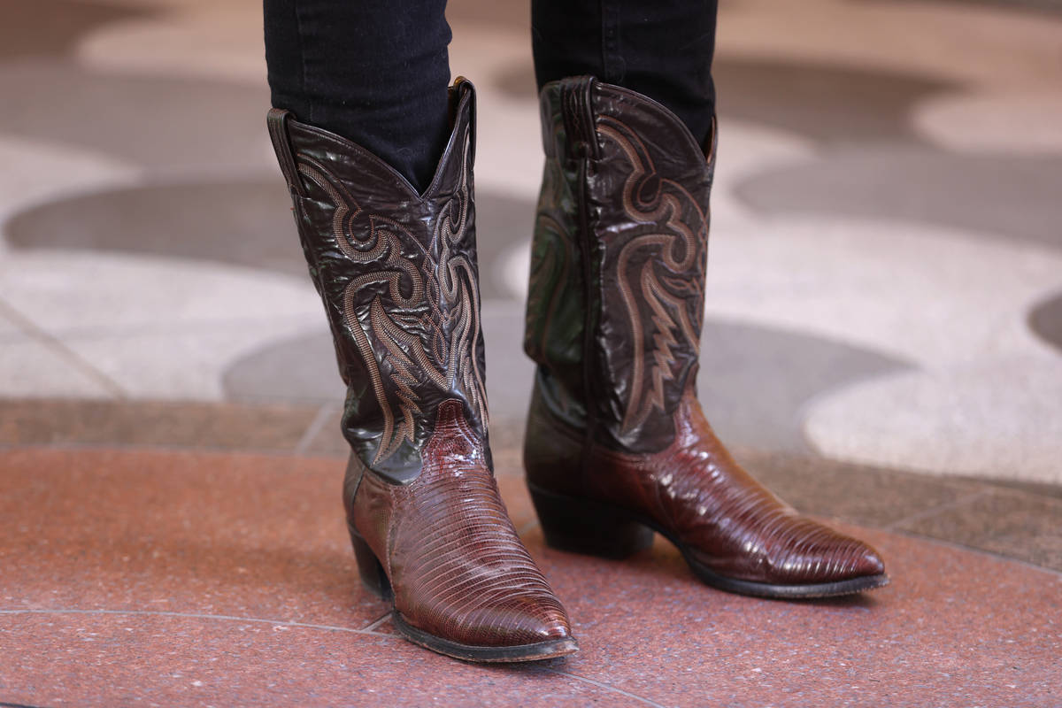 Roger Stone wears boots during an interview at the Ahern Hotel in Las Vegas, Saturday, Sept. 12 ...