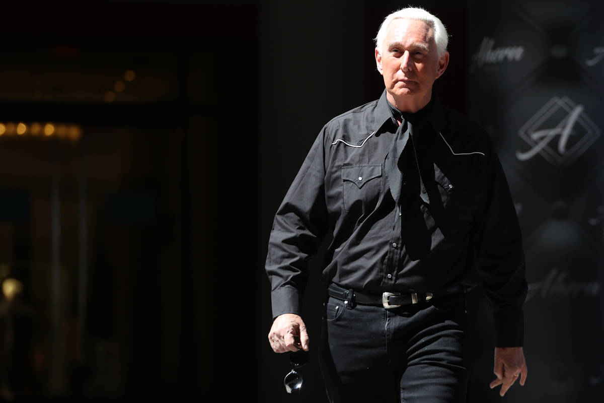 Roger Stone walks to an interview at the Ahern Hotel in Las Vegas, Saturday, Sept. 12, 2020. (E ...