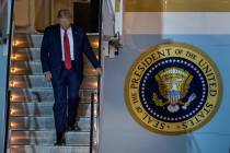 President Donald Trump arrives at McCarran International Airport and deplanes from Air Force On ...