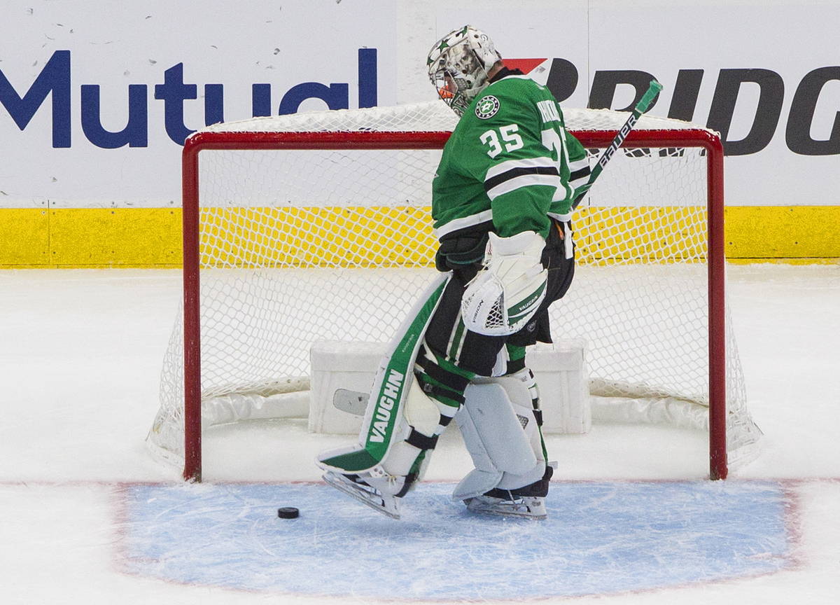 Dallas Stars goalie Anton Khudobin (35) kicks the puck after being scored against by Vegas Gold ...