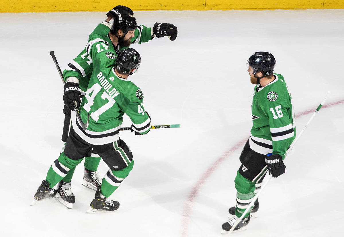 Dallas Stars' Jamie Benn (14) celebrates his goal against the Vegas Golden Knights with teammat ...