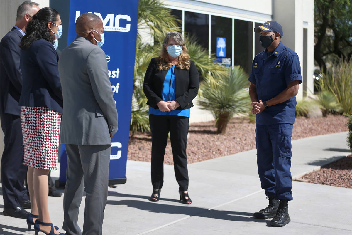 Vice Admiral Jerome M. Adams, U.S. Surgeon General, right, is greeted by local leaders includin ...