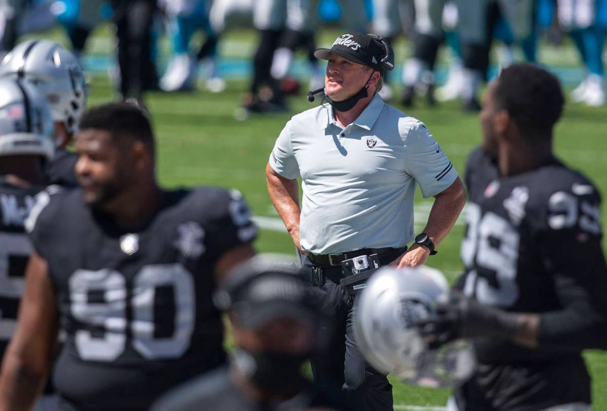 Las Vegas Raiders head coach Jon Gruden looks at the scoreboard in the 2nd quarter of an NFL fo ...