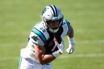 Carolina Panthers running back Christian McCaffrey runs against the Las Vegas Raiders during th ...