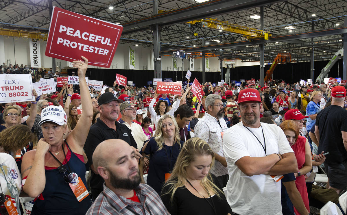 The crowd cheers during a Trump campaign rally at Xtreme Manufacturing on Sunday, Sept. 13, 202 ...