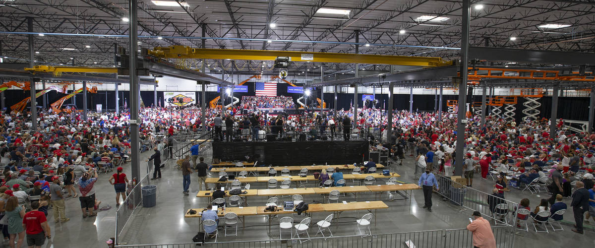 An Xtreme Manufacturing facility is packed with Trump campaign rally attendees on Sunday, Sept. ...