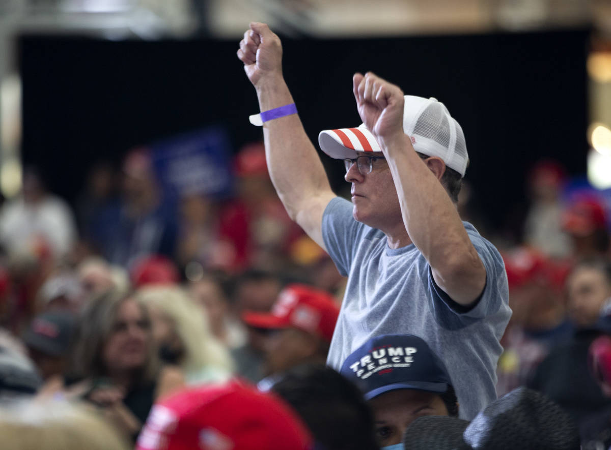 Frank Sollecito of Las Vegas dances to the music in between speakers during a Trump campaign ra ...