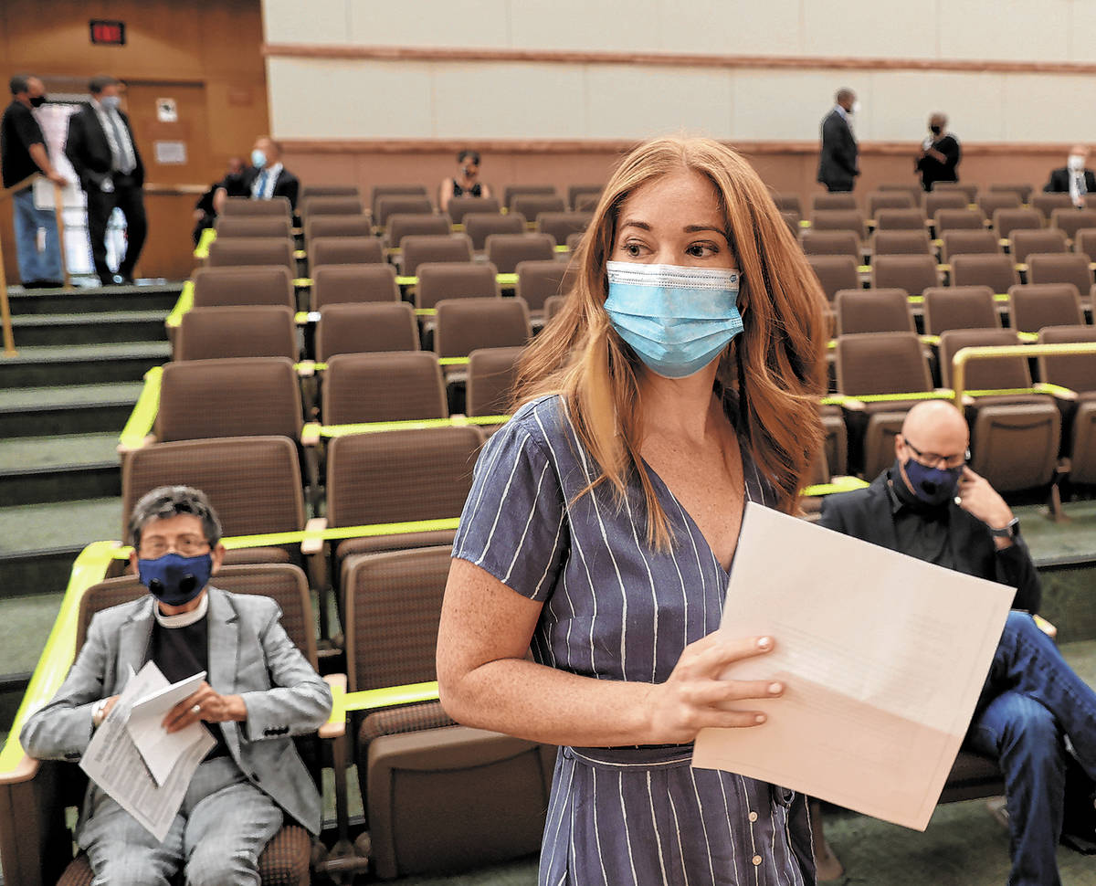 Kristen Corral, owner of Tacotarian restaurant, prepares to speak to Clark County Commissioners ...