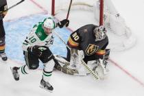Dallas Stars' Corey Perry (10) reacts as the puck goes in past Vegas Golden Knights goalie Robi ...