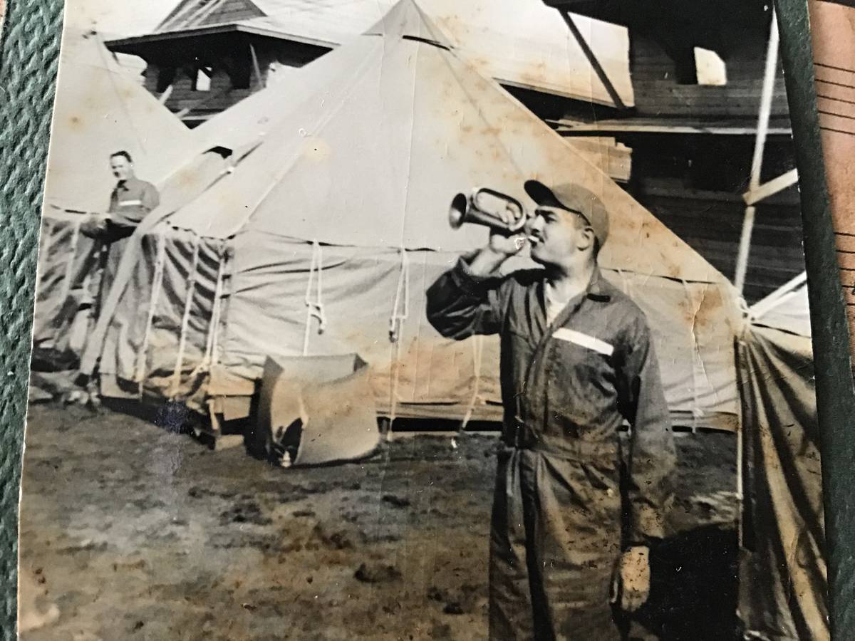Army Air Corp 1st Lt. Vincent Shank plays his trumpet at a prisoner of war camp during World Wa ...