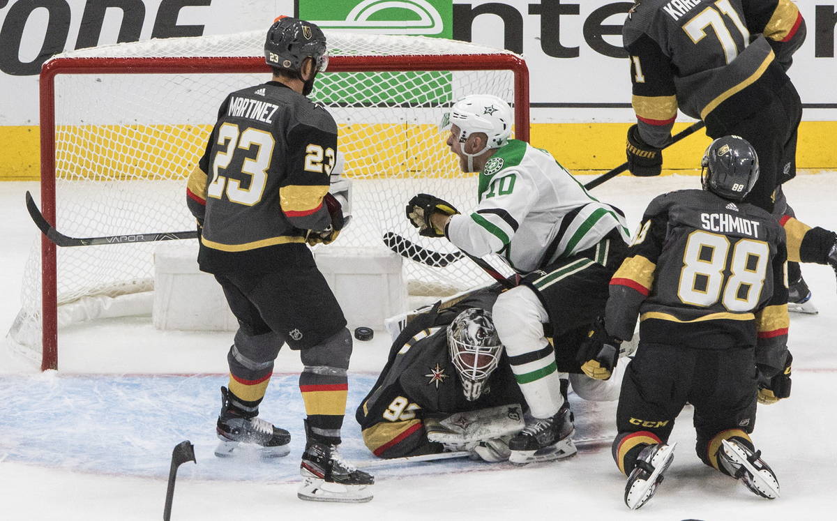 Dallas Stars' Corey Perry (10) reacts as the puck goes into the net past Vegas Golden Knights g ...