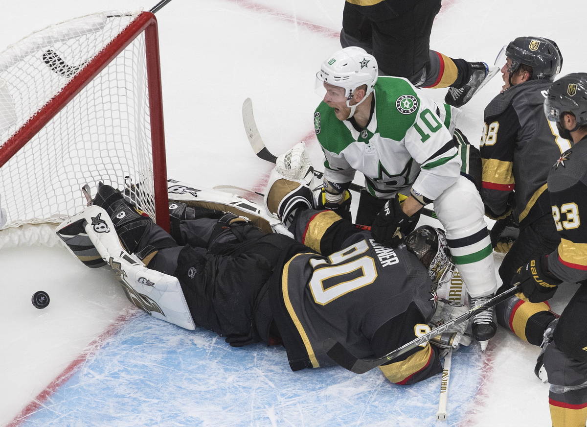 Dallas Stars' Corey Perry (10) watches the puck go into the net past Vegas Golden Knights goali ...
