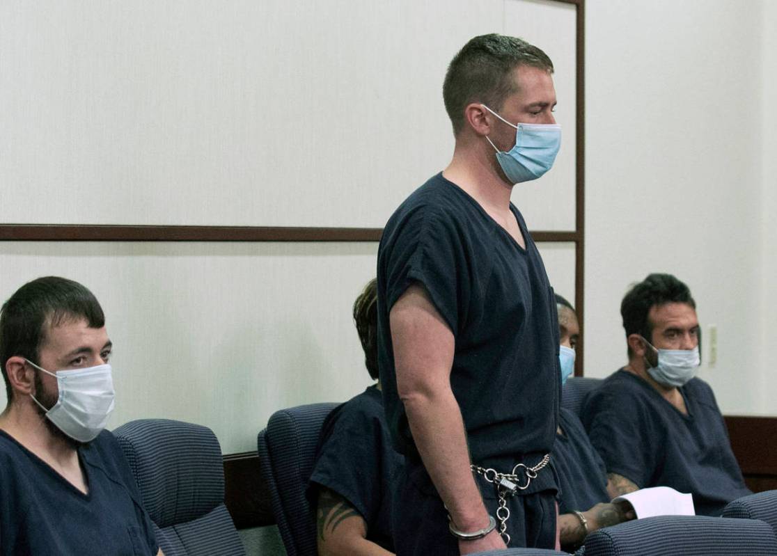 Benjamin Ames, center appears in a Henderson courtroom on Tuesday, Sept. 15, 2020. Ames is accu ...