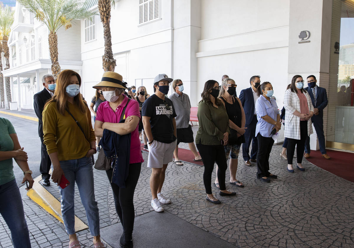 Gusts and employees wait as the Tropicana hotel-casino reopens to public, on Thursday, Sept. 17 ...
