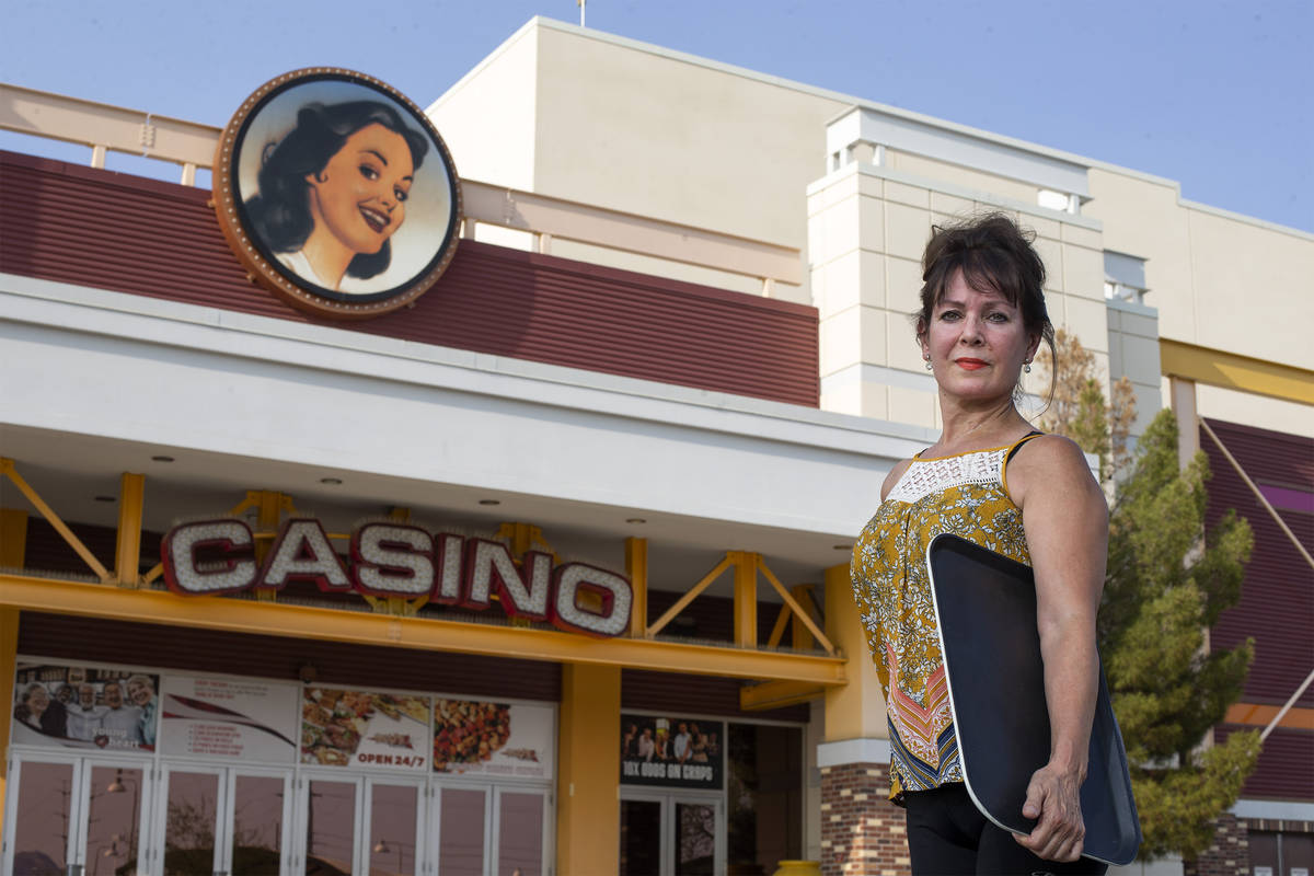 Sharon Beza, a former employee of Eastside Cannery hotel-casino, poses for a portrait outside h ...