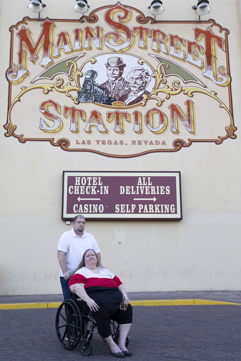 Married couple Jeff Gove and Lori Gove pose for a portrait outside Main Street Station on Thurs ...