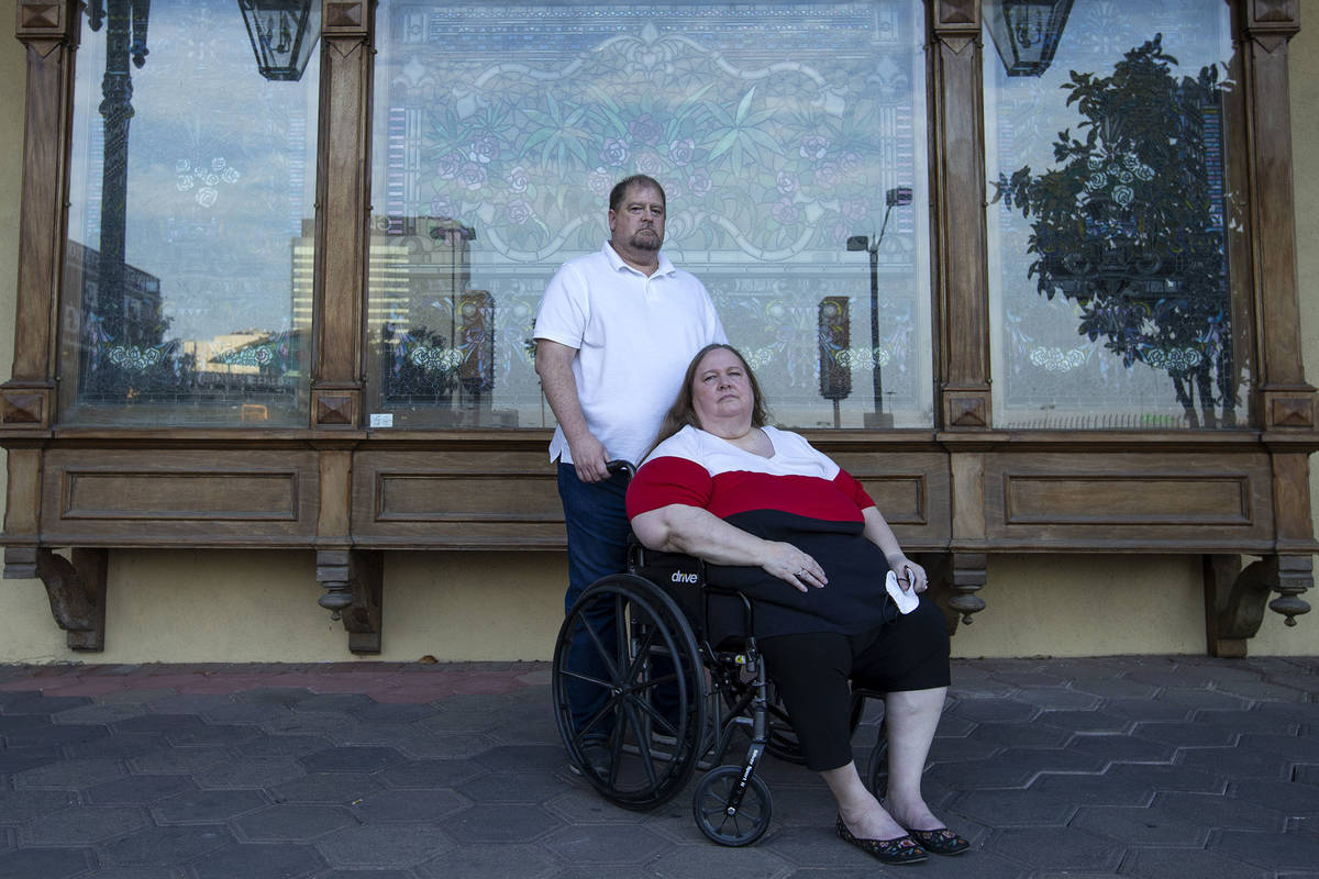 Married couple Jeff Gove and Lori Gove pose for a portrait outside Main Street Station on Thurs ...