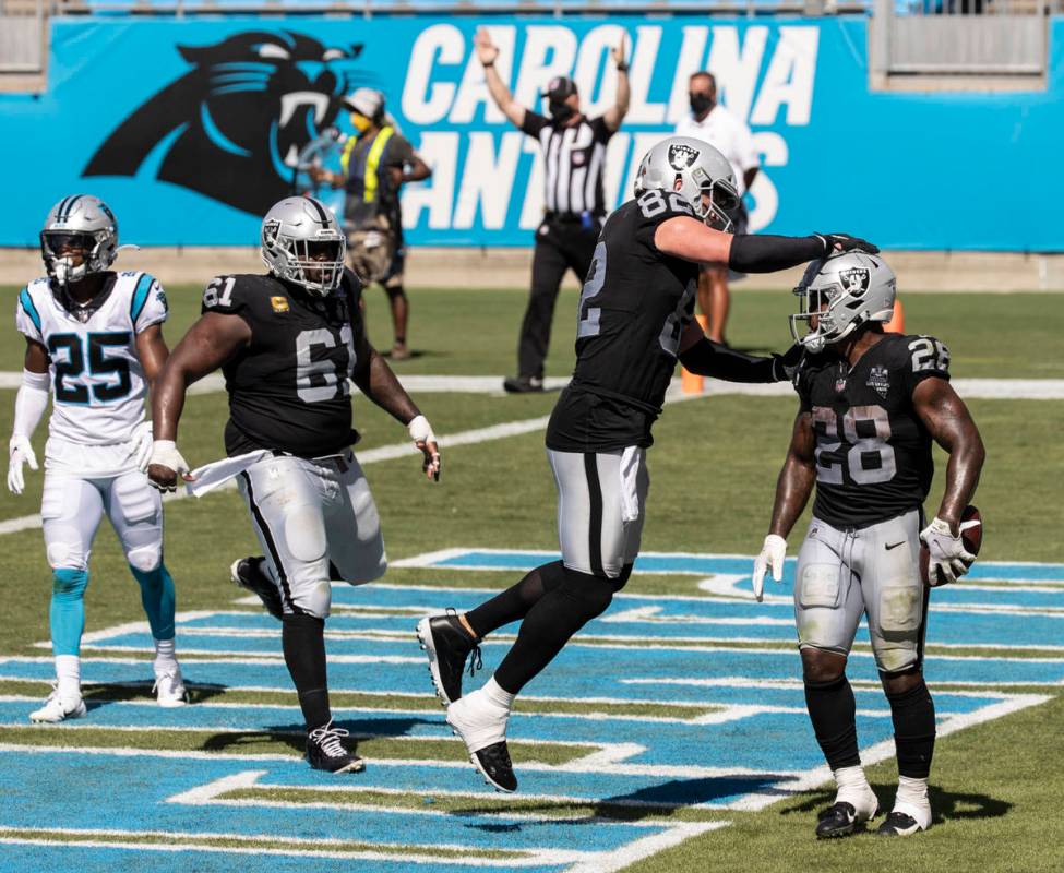 Las Vegas Raiders running back Josh Jacobs (28) celebrates after rushing for a third-quarter to ...