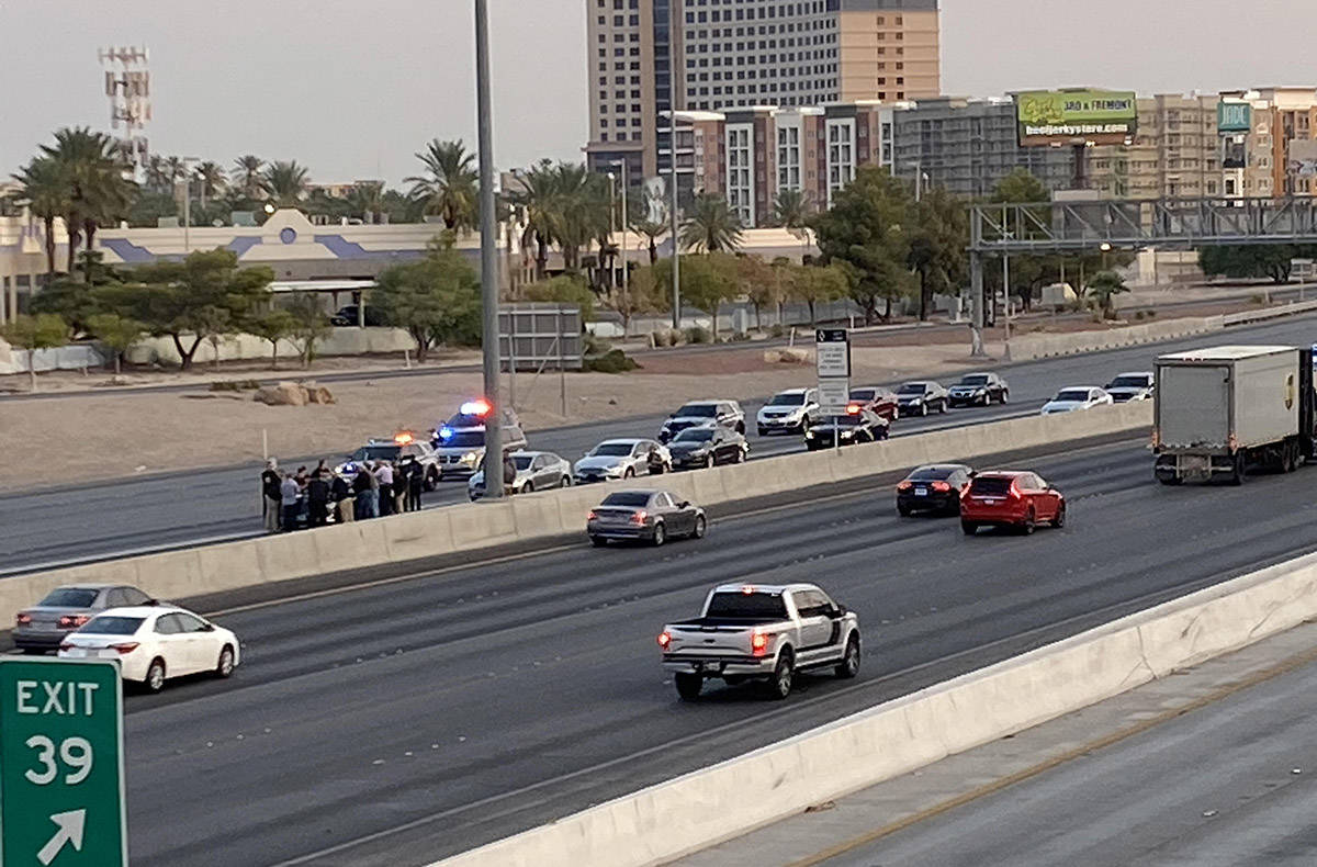 Las Vegas police investigate a fatal two-vehicle crash on Interstate 15 near Flamingo Road, whi ...