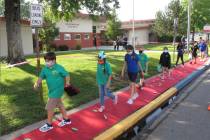FILE - In this Aug. 18, 2020, file photo, students return to Greenbrae Elementary School in Spa ...