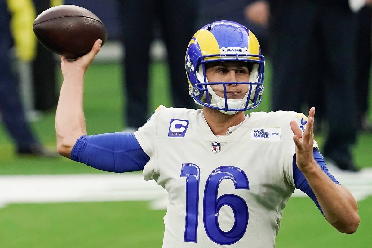 Los Angeles Rams quarterback Jared Goff throws during the first half of an NFL football game ag ...