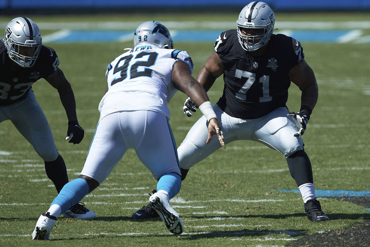 Las Vegas Raiders offensive tackle Denzelle Good (71) prepares to block Carolina Panthers defen ...