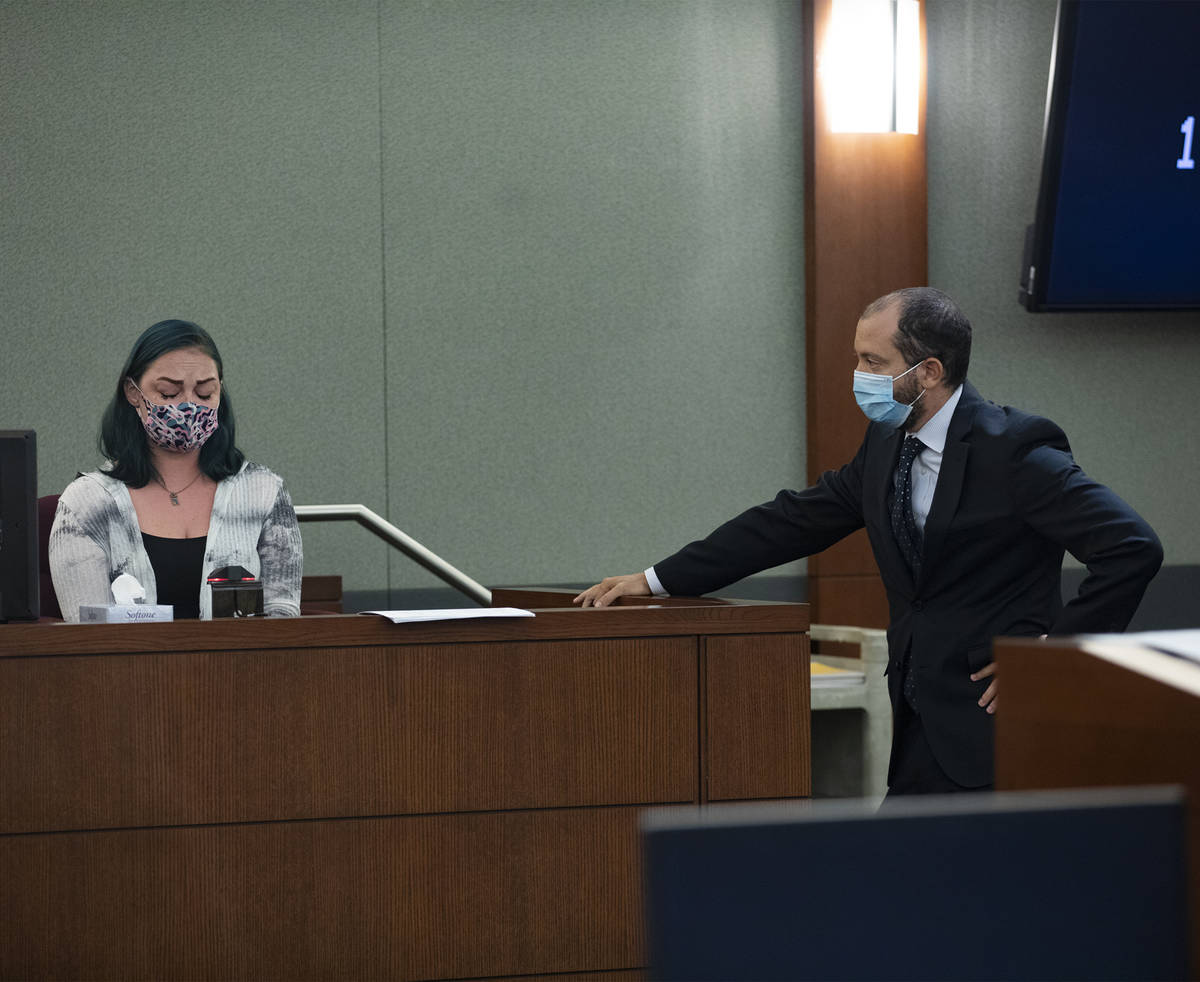 Prosecutor Christopher Hamner, right, cross-examines Alisha Burns, left, during an evidentiary ...