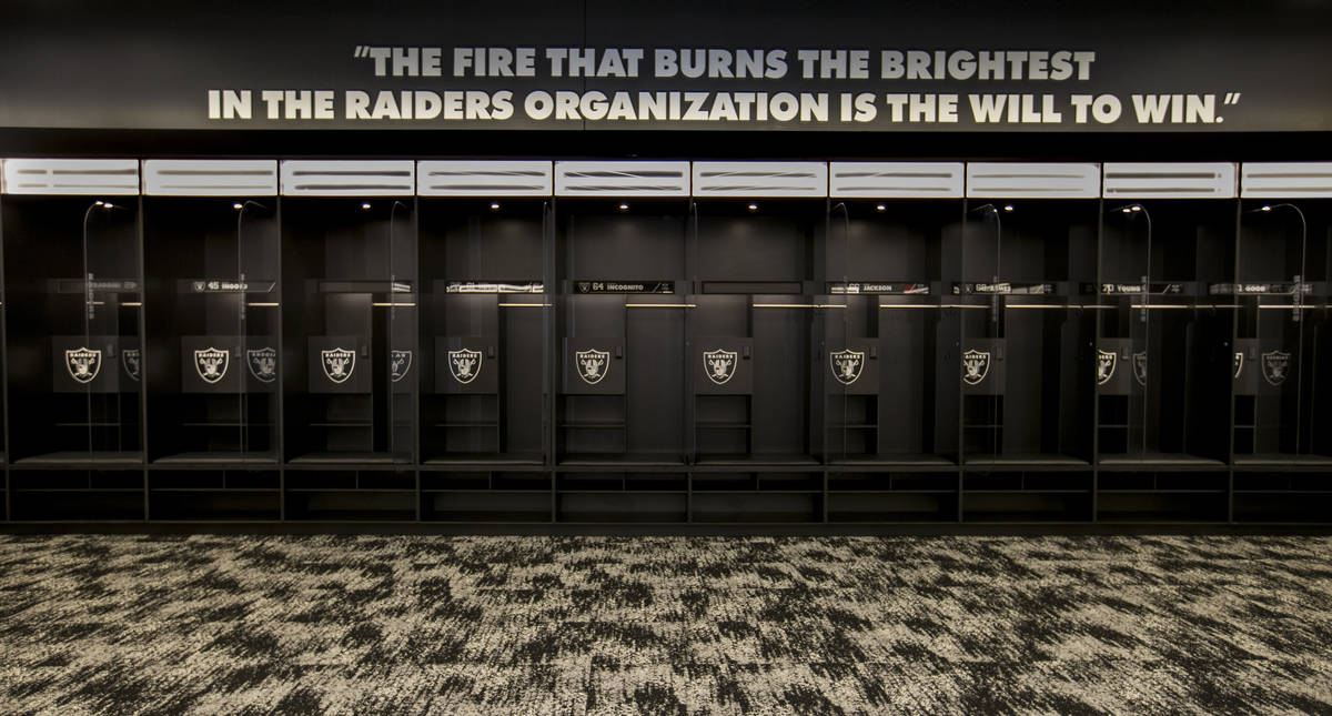 The locker room for the Las Vegas Raiders features a large logo and plenty of room to move for ...