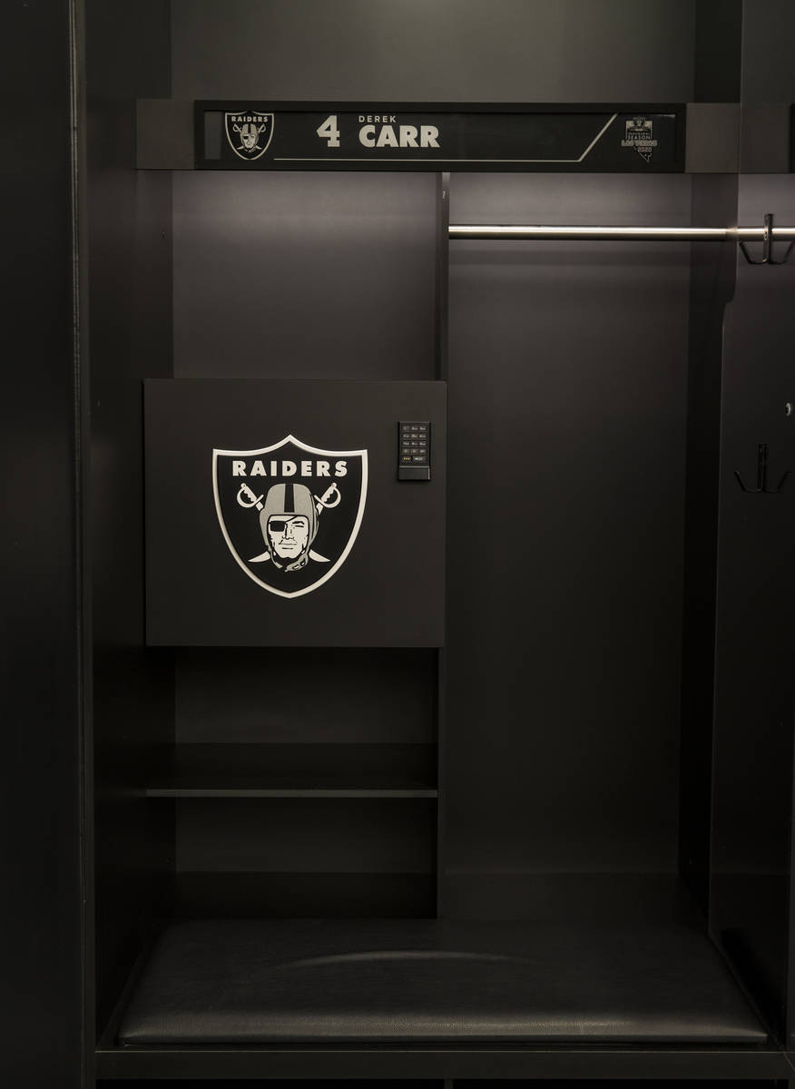 The locker room for the Las Vegas Raiders features a large logo and plenty of room to move for ...