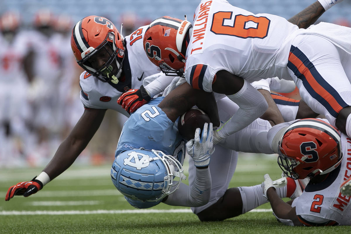 North Carolina's Dyami Brown (2) is stopped at the goal line after a 15-yard pass completion fr ...