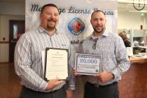 James Johnson, left, and his partner, Matthew Tipple, both of DeBary, Fla., pose for a photo af ...