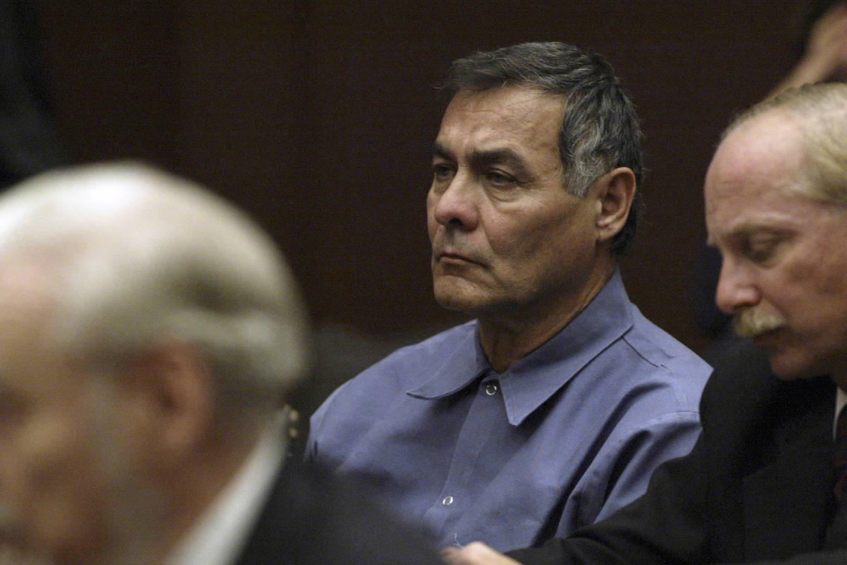 Frank LaPena, left, and his Las Vegas attorney Carmine Colucci listens as former Supreme Court ...