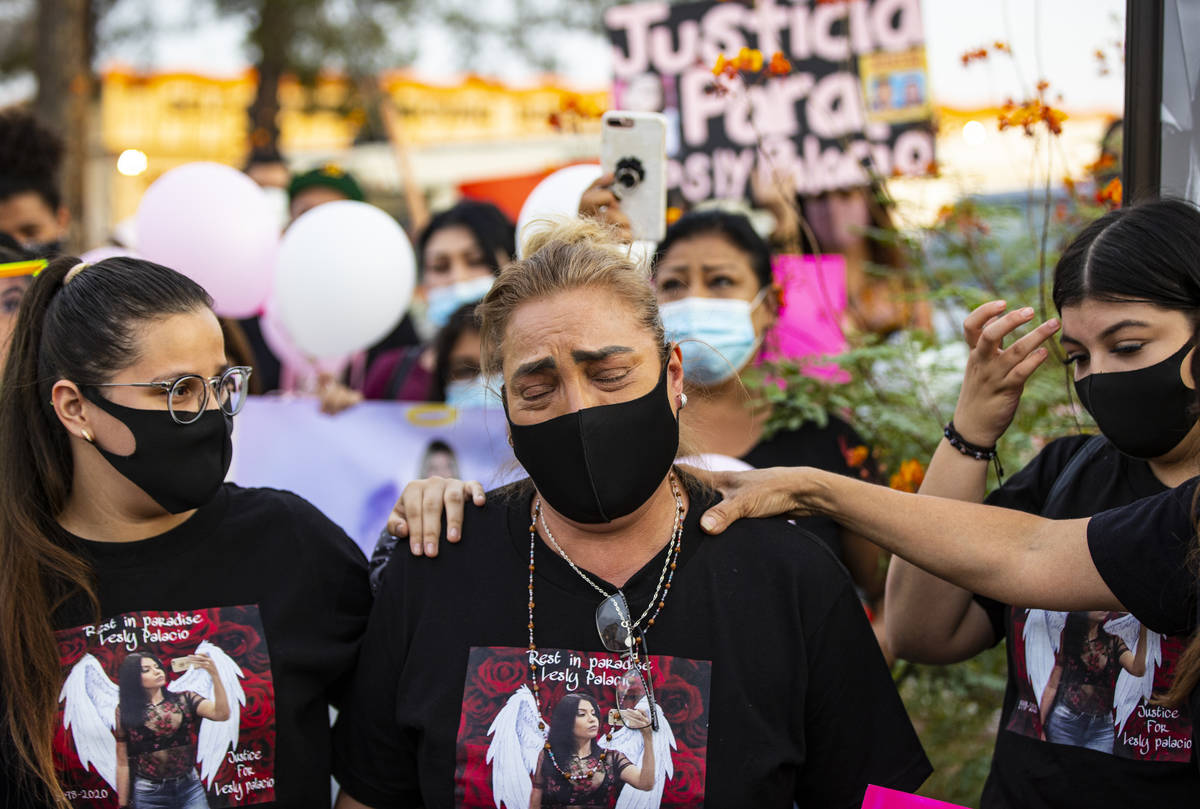 Aracely Palacio, center, is comforted while talking about her daughter Lesly Palacio, who was f ...
