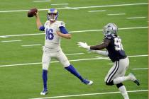 Los Angeles Rams quarterback Jared Goff throws against the Dallas Cowboys during the first half ...