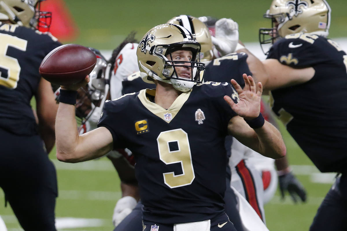 New Orleans Saints quarterback Drew Brees (9) passes in the second half of an NFL football game ...